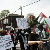 Pro-Palestinian supporters march during a protest over the Israel-Hamas crisis in Dearborn, Michigan, on Tuesday.  | BLOOMBERG 