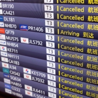 The latest figures underline the government’s struggles in checking up on arrivals\' health and adherence with quarantine protocols, which is key to avoid to stopping new coronavirus variants running rampant overseas from spreading in Japan. |  AFP-JIJI