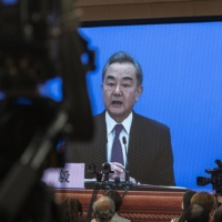 Chinese Foreign Minister Wang Yi answers a question during a virtual news conference in March.


 | GETTY IMAGES / VIA BLOOMBERG 