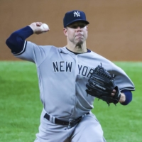 Yankees starter Corey Kluber pitches against the Rangers during the fourth inning in Arlington, Texas, on Wednesday. | USA TODAY / VIA REUTERS