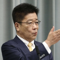 Chief Cabinet Secretary Katsunobu Kato speaks at a news conference at the Prime Minister\'s Office Thursday. | KYODO