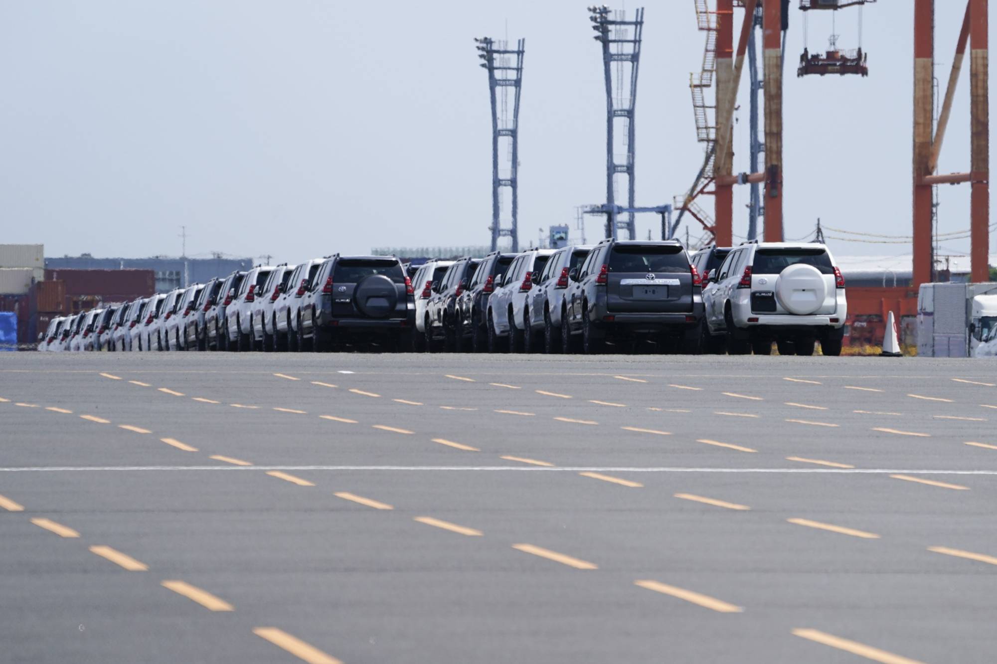 The global chip shortage that has been hitting automakers particularly hard is unlikely to end anytime soon. | BLOOMBERG