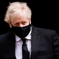 Officials privately suspect U.K. Prime Minister Boris Johnson and his team were reluctant to close the border to travelers from India for political reasons. | REUTERS
