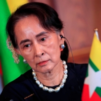 Aung San Suu Kyi attends a joint news conference in Tokyo in October 2018. | REUTERS