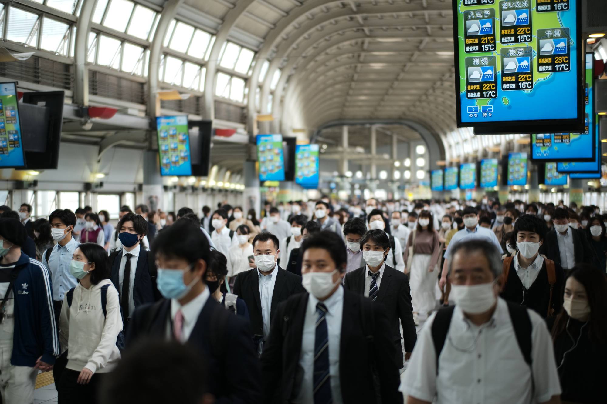 While younger people are being blamed by some media outlets for the spread of COVID-19, adults and older residents continue to crowd the capital's train stations each morning and evening. | Ryusei Takahashi 