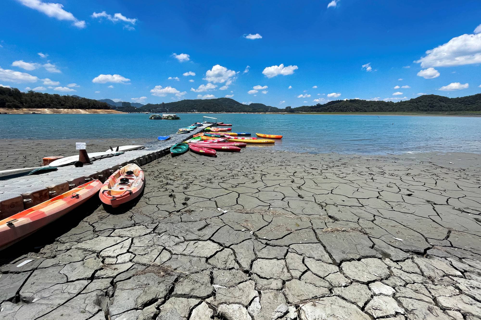 Boats sit at a pier on Sun Moon Lake in Nantou, Taiwan, on May 15 during an island-wide drought. | REUTERS