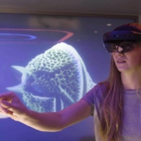 Microsoft in March released Mesh, a software kit for companies to develop immersive apps that work across various types of devices, including the company\'s HoloLens headsets. | MICROSOFT
