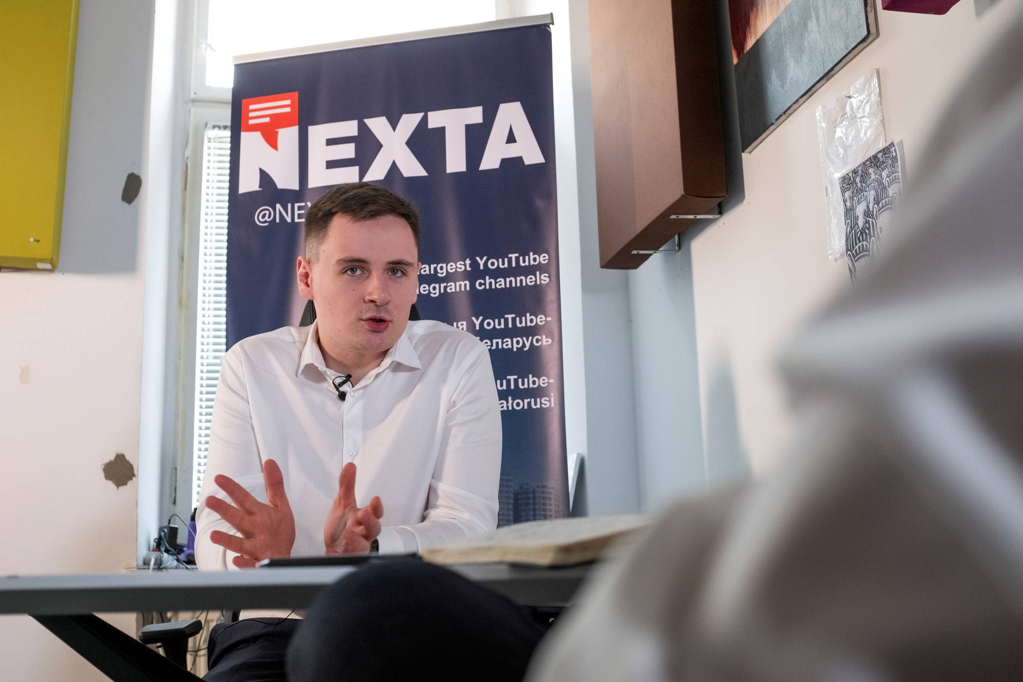 Warsaw-based Belarusian blogger Stsiapan Putsila speaks during an interview in Warsaw on Monday.  | REUTERS 