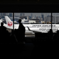 Haneda Airport on May 4. People entering Japan from India and several other countries from Friday will have to self-isolate at government-designated facilities for 10 days. | AFP-JIJI