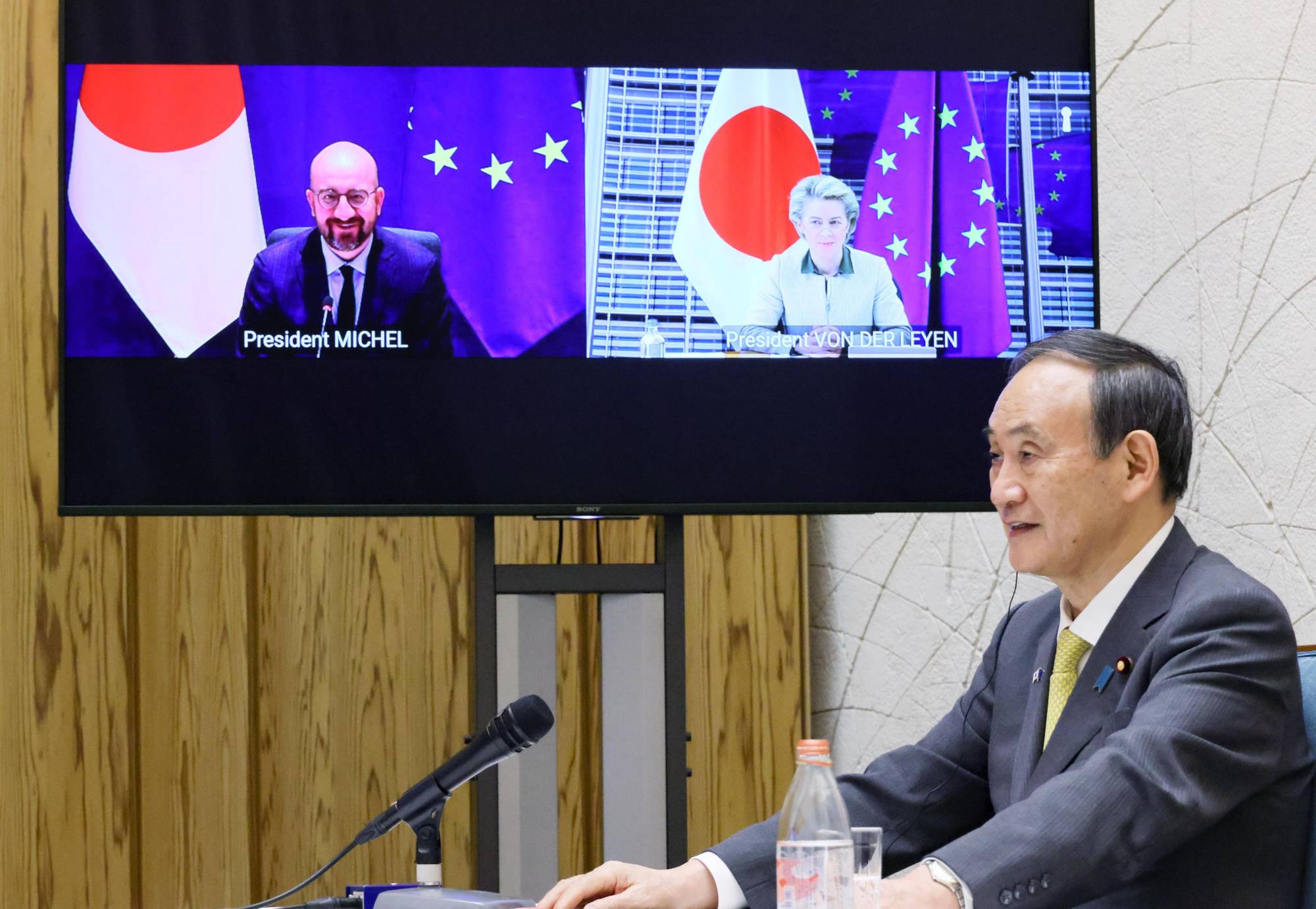 Prime Minister Yoshihide Suga attends a virtual conference with European Union leaders on Thursday. | CABINET PUBLIC RELATIONS OFFICE / VIA KYODO