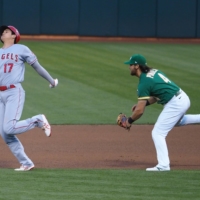 Shohei Ohtani reacts after being tagged out by Athletics second baseman Chad Pinder during the fourth inning in Oakland, California, on Thursday. | USA TODAY / VIA REUTERS