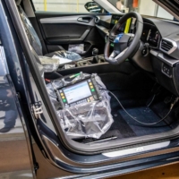 A computer sits plugged into a Cupra Formentor automobile on the production line at the Seat SA, a unit of Volkswagen AG, at its Martorell plant near Barcelona.  | BLOOMBERG 