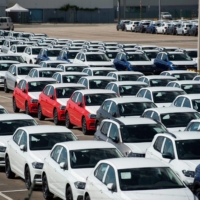 Around 5,000 unfinished cars remain parked outside the Volkswagen Navarra factory in Pamplona on May 14 due to lack of semiconductor supply.  | AFP-JIJI