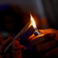 The Japan Advocacy Network for Drug Policy claims a harsher Cannabis Control Law could deny both jobs and housing to those convicted of minor drug offenses, leading people into a \"vicious cycle\" of poverty and crime. | REUTERS