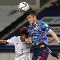 Japan defender Naomichi Ueda (right) made nine appearances for Nimes during his half-season loan. The French club, which was relegated from the first-division Ligue 1 after finishing 19th, has opted to buy out Ueda\'s contract from Belgium\'s Cercle Brugge. | REUTERS