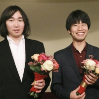 Japanese pianists Keigo Mukawa (right) and Tomoki Sakata won third and fourth prize, respectively, at the Queen Elisabeth Competition, a prestigious contest for international musicians held in Brussels. | KYODO 
