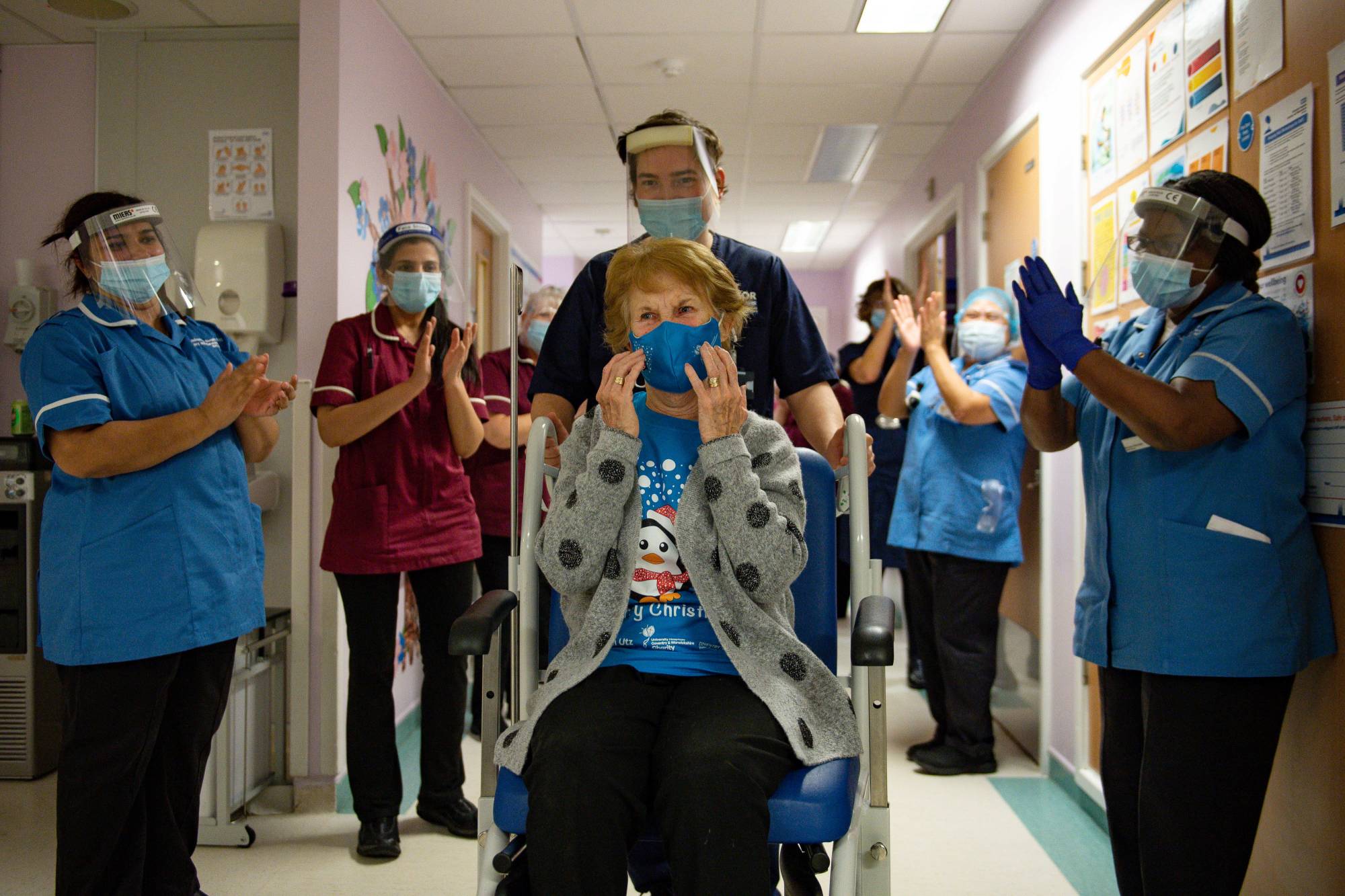 Margaret Keenan, then 90, was the first person in the United Kingdom to receive the Pfizer/BioNtech COVID-19 vaccine when she was vaccinated on Dec. 8. The U.K. was the first country to start using the shots. | POOL / VIA REUTERS