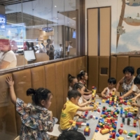 A children\'s play area at a restaurant in Beijing in June 2018. China has  increased the number of children married couples are legally permitted to have, from two to three, in an effort to stave off a looming crisis as the birthrate in the world’s most populous country steadily falls. | GILLES SABRIE / THE NEW YORK TIMES