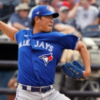 Pitcher Shun Yamaguchi, seen with the Blue Jays in 2020, will attempt to get his career back on track by returning to Japan this season. | USA TODAY / VIA REUTERS