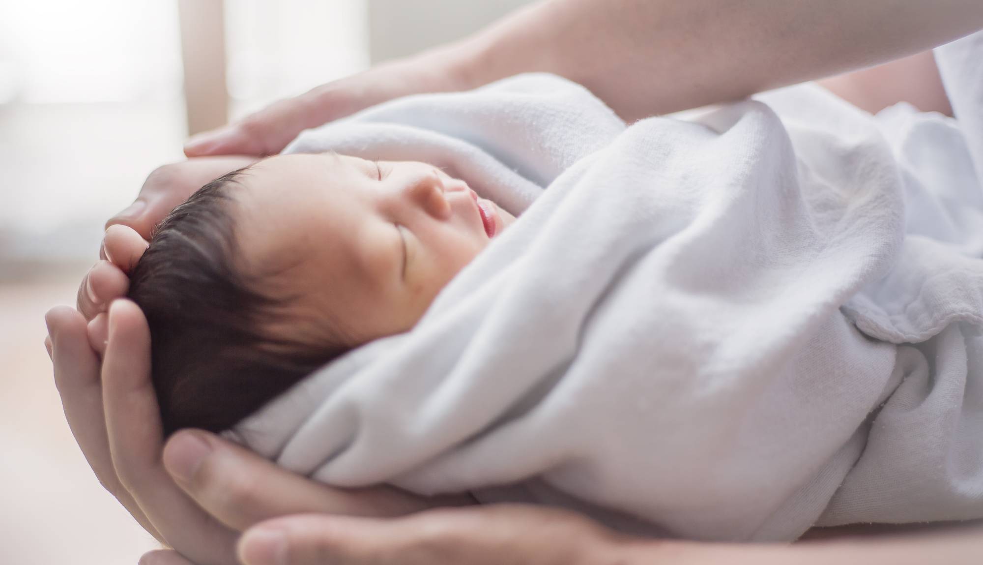 Japan's House of Representatives passed a bill to revise the law on child care leave to create a special plan allowing fathers to take a total of four weeks off within eight weeks of a child's birth.  | GETTY IMAGES