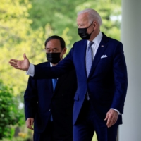 U.S. President Joe Biden and Prime Minister Yoshihide Suga arrive for a joint news conference in the Rose Garden at the White House on April 16. | REUTERS 