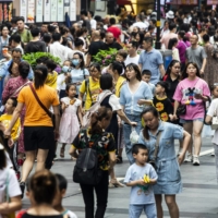 A shopping area in the city of Chongqing, China, on June 1 | BLOOMBERG 