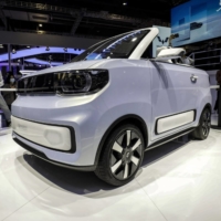 A Wuling Hongguang Mini convertible electric vehicle is displayed at the Shanghai Auto Show in April.  | BLOOMBERG 