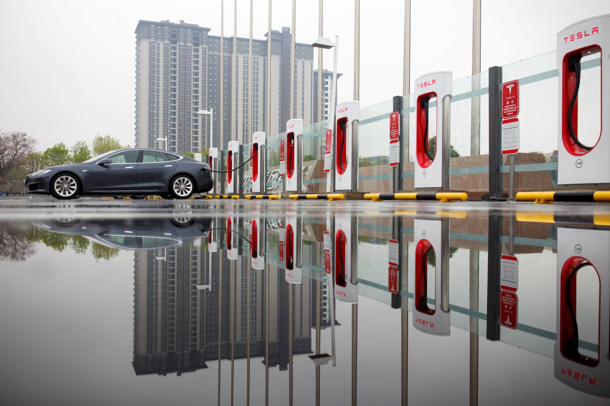 A Tesla car at a charging point in Beijing in 2018 | Reuters 