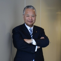Akira Amari, a former economy minister who heads an LDP working group on semiconductor strategy, says Japan must must seek to cooperate with Taiwan Semiconductor Manufacturing Co. | BLOOMBERG