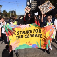 Students march during a rally calling for climate action in Melbourne on May 21.  | AFP-JIJI