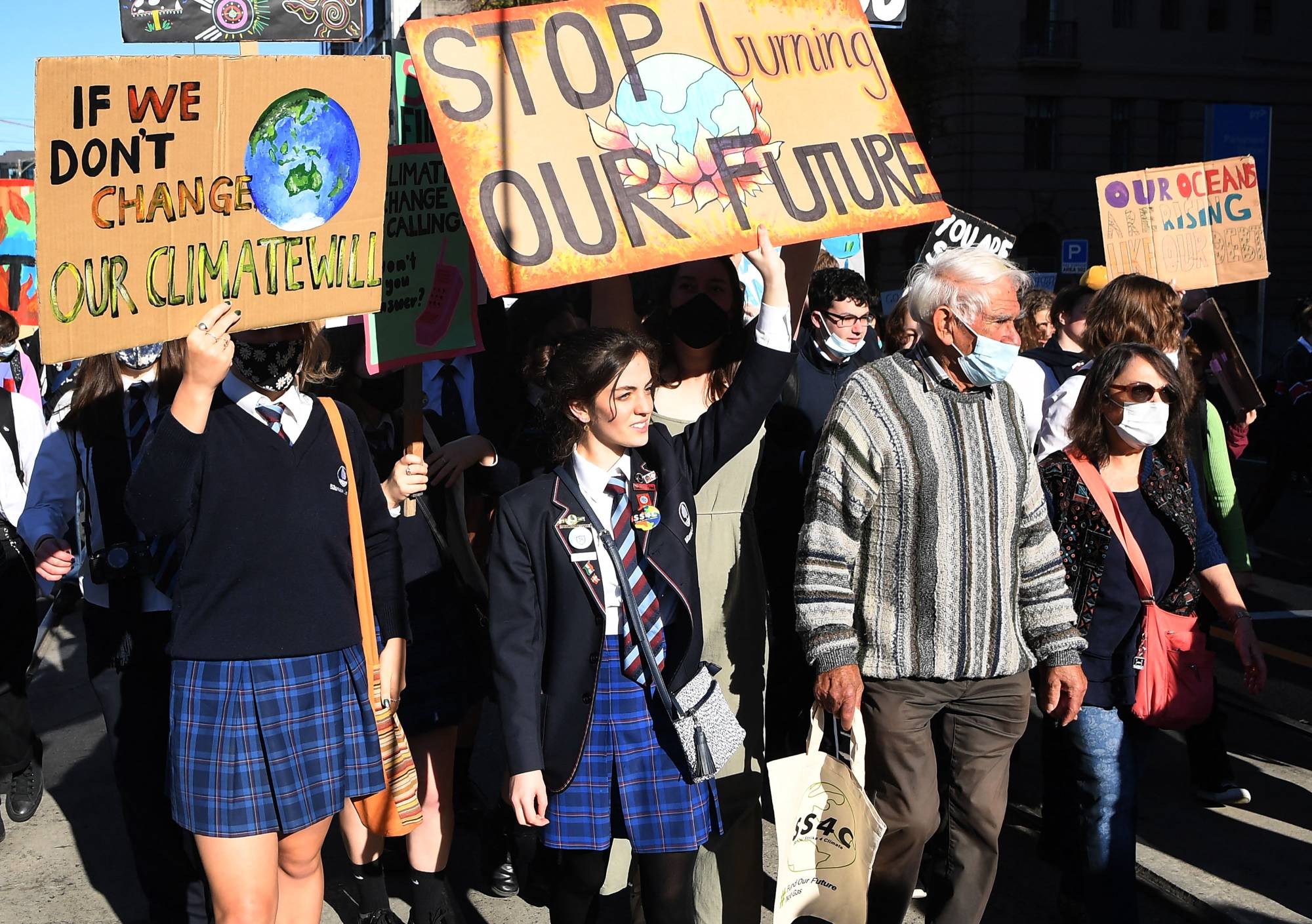 Students march during a rally calling for climate action in Melbourne on May 21. | AFP-JIJI