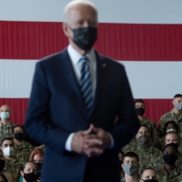 U.S. President Joe Biden prepares to address U.S. Air Force personnel and their families stationed at Royal Air Force Mildenhall in England on Wednesday.  | AFP-JIJI