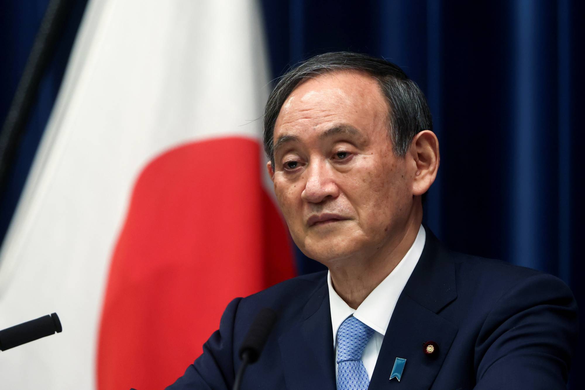 Yoshihide Suga   | POOL / VIA REUTERS