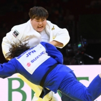 Sara Asahina (white) fights Wakaba Tomita in the women\'s over-78-kg category at the 2021 Judo World Championships on Saturday in Budapest. | AFP-JIJI