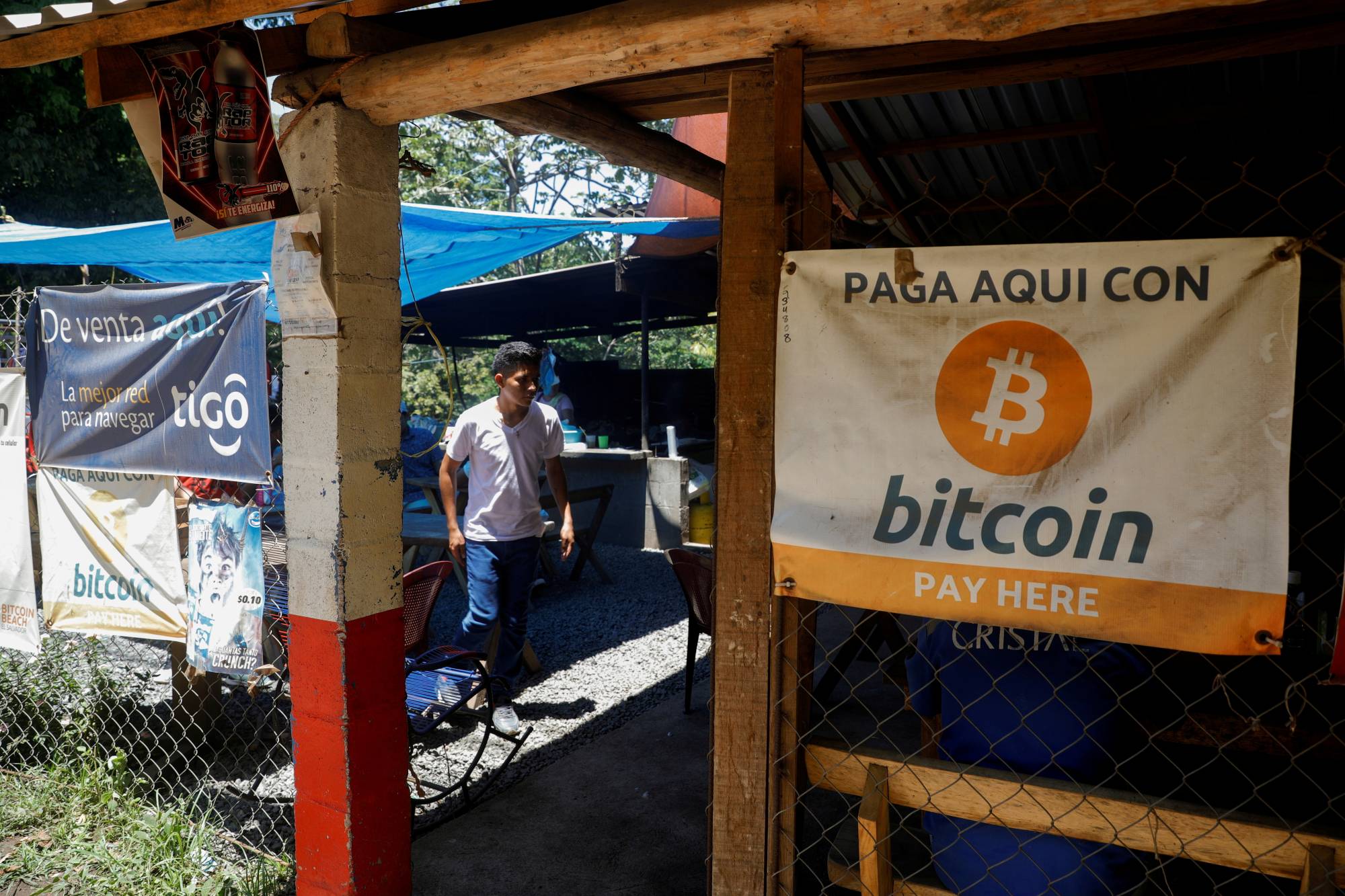 Bitcoin banners outside of a small restaurant at El Zonte Beach in Chiltiupan, El Salvador, on June 8 | REUTERS 