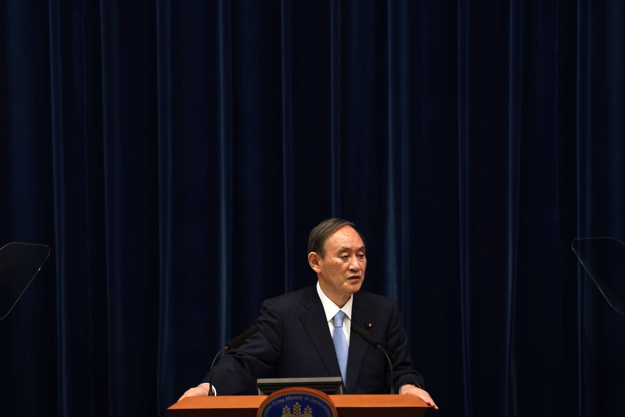 Prime Minister Yoshihide Suga in May. If the pandemic was not continuing to disrupt daily lives, he would have enough achievements under his belt to be untroubled by the ruling Liberal Democratic Party's leadership contest and the general election. | POOL  / VIA REUTERS