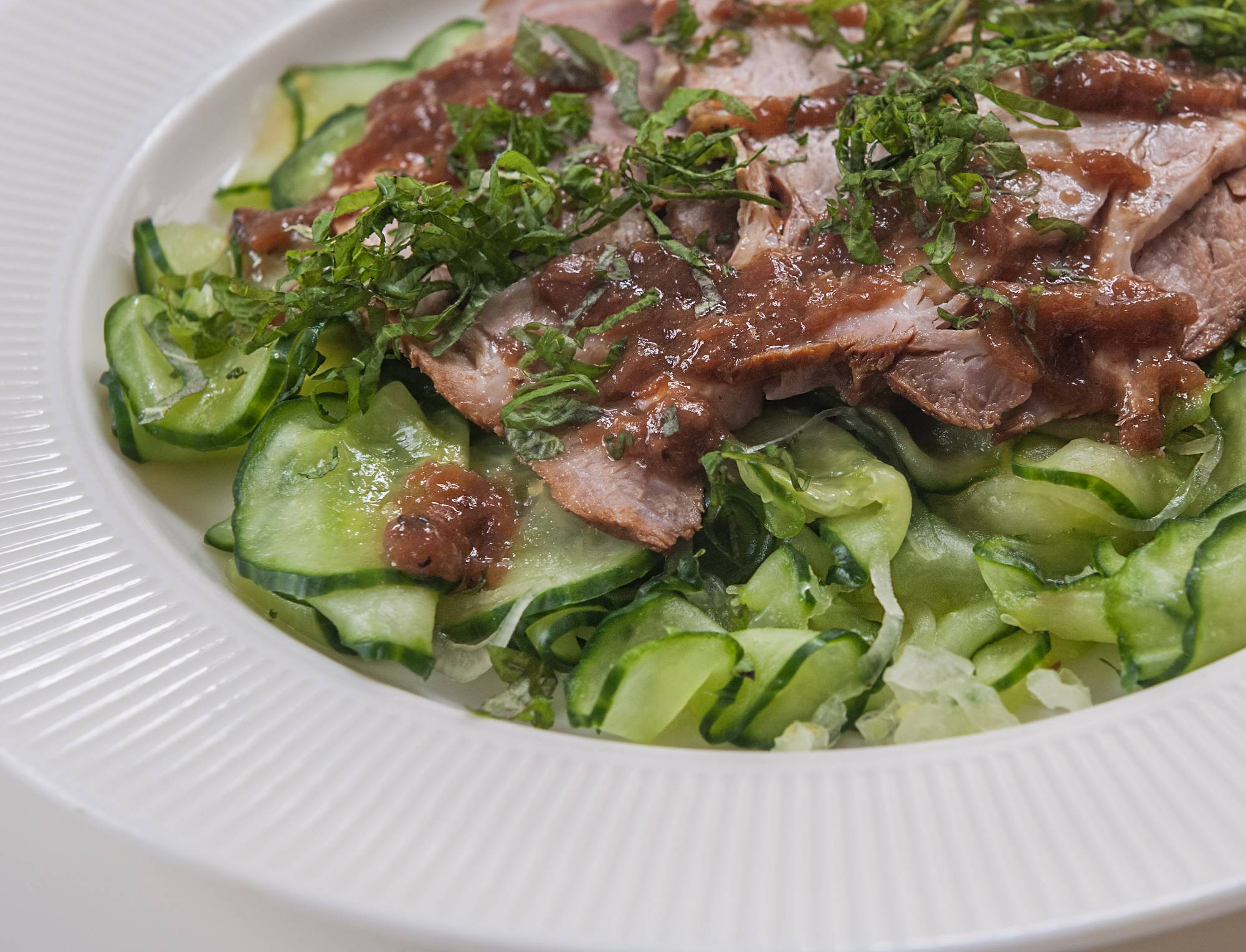 Tender slices of make-ahead pork and a flavorful ume dressing are the perfect toppings for a light summer salad. | MAKIKO ITOH