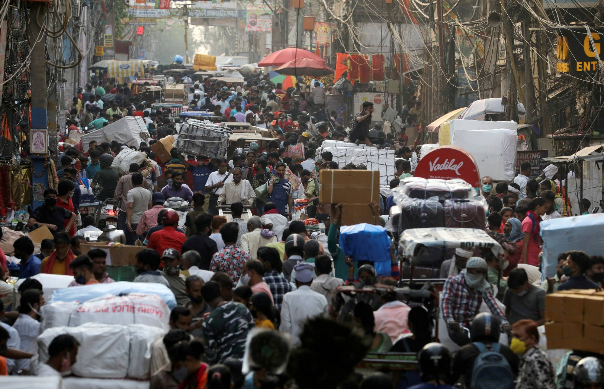 A crowded market in the old quarters of Delhi in April | REUTERS 
