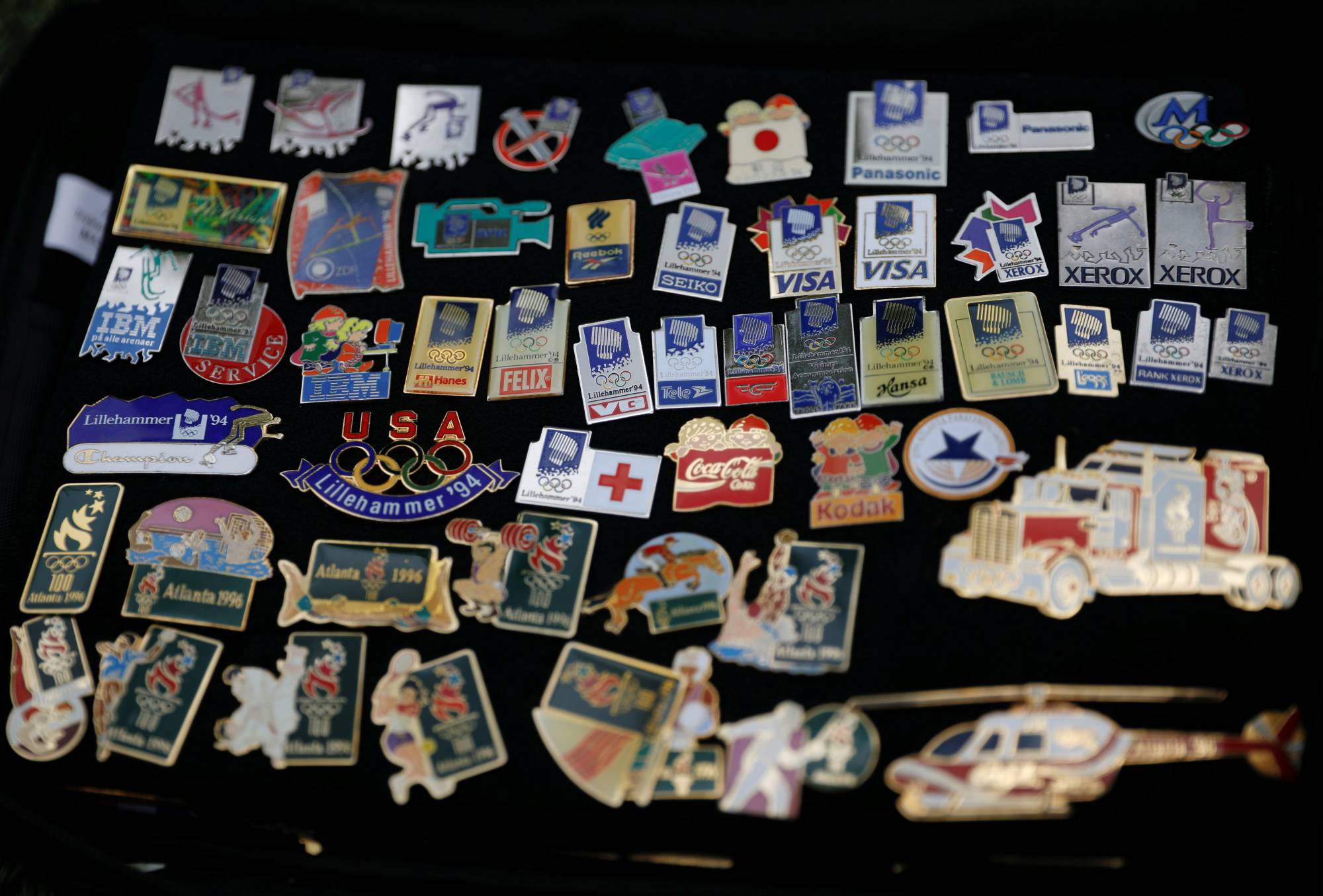 Olympic pin collectors lament loss of trading chances in