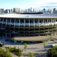 The National Stadium in Tokyo on Thursday. An intensifying clash between the central government and its own advisers over attendance restrictions during the Tokyo Games is hounding organizers. | REUTERS