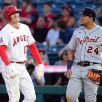 Angels pitcher Shohei Ohtani (left) speaks with Tigers first baseman Miguel Cabrera during the fifth inning at Angel Stadium in Anaheim, California, on Thursday. | USA TODAY / VIA REUTERS
