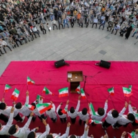 Supporters of Ebrahim Raisi rally after his election victory, in Tehran on Saturday.  | AFP-JIJI