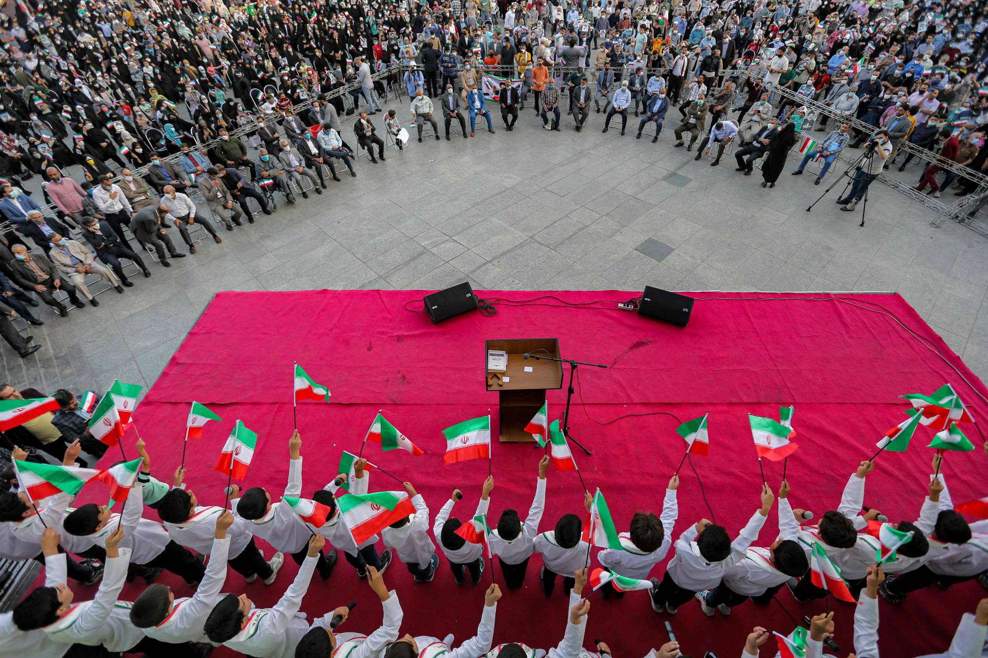 Supporters of Ebrahim Raisi rally after his election victory, in Tehran on Saturday.  | AFP-JIJI