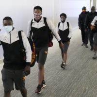 Members of Uganda\'s Olympic team arrive at Narita Airport on Sunday.  | KYODO 