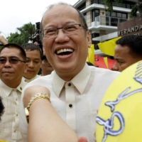 Former Philippine President Benigno Aquino is welcomed by supporters upon arrival at his private residence on Times Street in Quezon city, metro Manila, in 2016. | REUTERS 