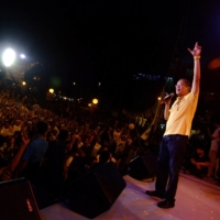 Benigno Aquino III waves to supporters during a campaign stop in Quezon City, Philippines in February 2010. | JES AZNAR / THE NEW YORK TIMES