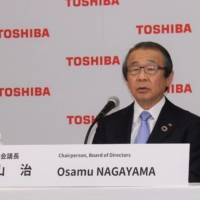 Osamu Nagayama, chairman of Toshiba\'s board of directors, holds a news conference in Tokyo on June 14. The firm\'s annual general shareholders meeting on Friday is set to be a showdown between Toshiba’s board of directors pushing to retain Nagayama and investors who want him out. | COURTESY OF TOSHIBA / VIA REUTERS