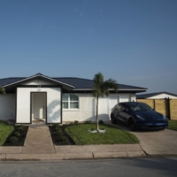 A home on Weems Street in Boca Chica Village, Texas, featuring a Tesla Solar Roof | BLOOMBERG 