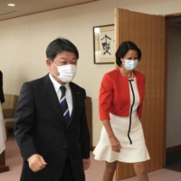 Foreign Minister Toshimitsu Motegi, alongside U.N. envoy to Myanmar Christine Schraner Burgener, in Tokyo last month.  | AFP-JIJI