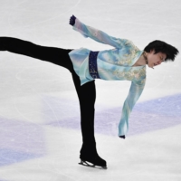 Yuzuru Hanyu performs during the World Figure Skating Championships on March 27 in Stockholm. | TT NEWS AGENCY / VIA REUTERS